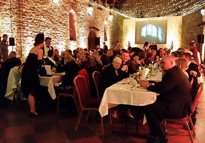 Audience immersed in a brand activation murder mystery